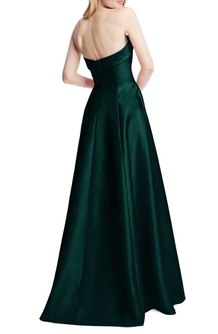 This strapless satin gown with a structured bodice and side-slant pockets features a twirl-ready full circle skirt. 54 1/2" length (size 8) Square neck Strapless Lined 100% polyester Dry clean or hand wash, line dry Imported 50s Evening Gown, Blue Prom Gown, Strapless Ball Gown, Midnight Blue Dress, Elegant Ball Gowns, Alfred Sung, Strapless Prom Dresses, Full Circle Skirt, Princess Ball Gowns