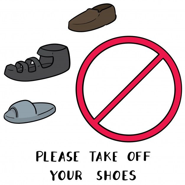 there is a sign that says please take off your shoes and slip ons in the bottom right hand corner