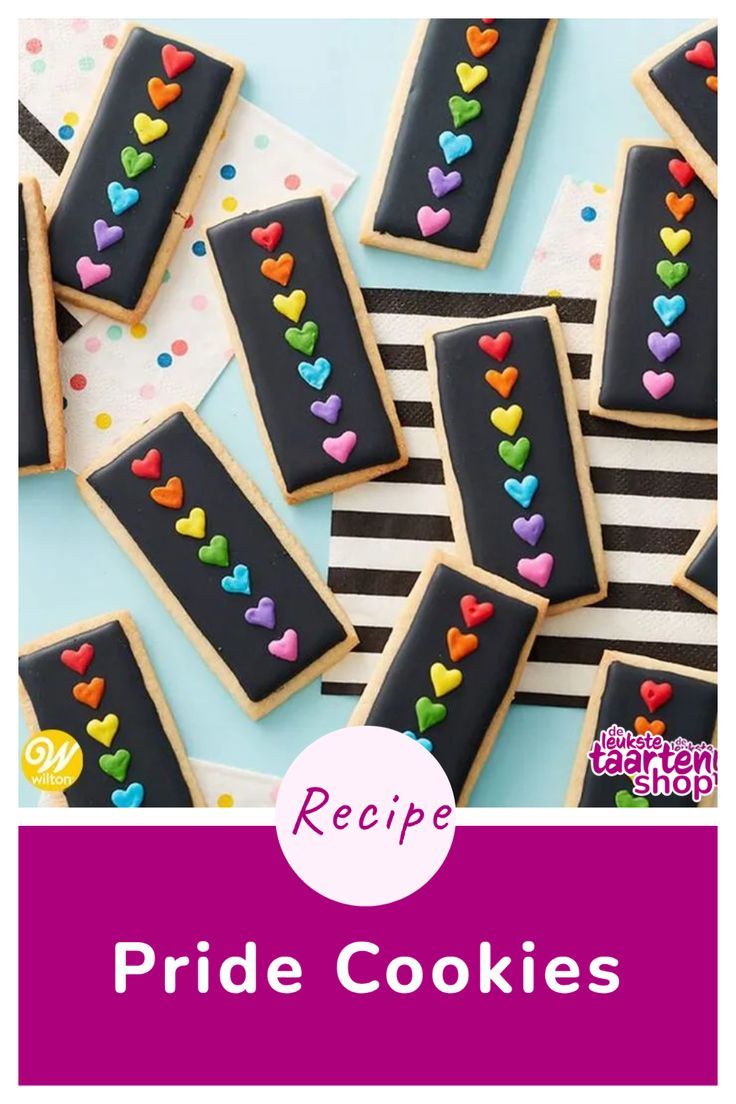 some cookies with hearts on them and the words recipe pride cookies written in rainbow colors