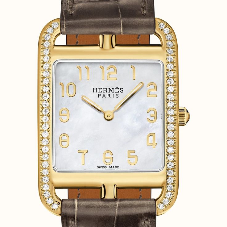 Diamond-set yellow gold watch with dropped setting, diamond-set white natural mother-of-pearl dial, 23 x 23 mm, long interchangeable strap in smooth alligator Technical Details Case: Designer: Henri d'Origny (1991) 3N 750 Yellow-gold case. Dropped setting (≈ 24.53 g), 46 diamonds (0.41 ct) A square within a rectangle », 23 x 23 mm, 14 mm large inter-horn Size : Small Model (PM) Top Wesselton V.V.S « extra white » to « plus extra white » diamonds Anti-glare sapphire crystal Water-resistant to 3 b Hermes Watch, Crystal Water, Seaside Resort, House Gifts, Fine Watches, Iconic Bags, Crocodile Leather, Pearl Diamond, Diamond Set