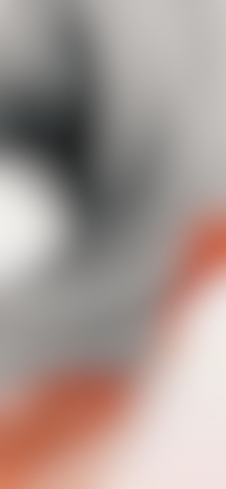 blurry image of an orange and gray background