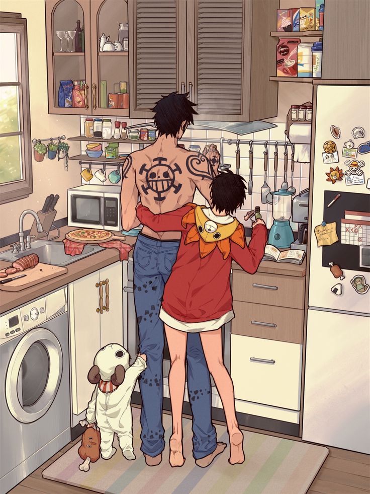 a man and woman standing in a kitchen next to each other with a dog on the floor