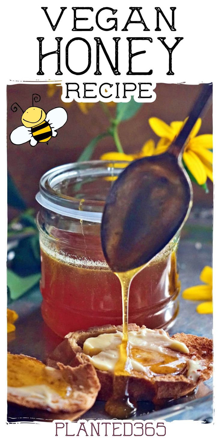 a jar filled with honey sitting on top of a table