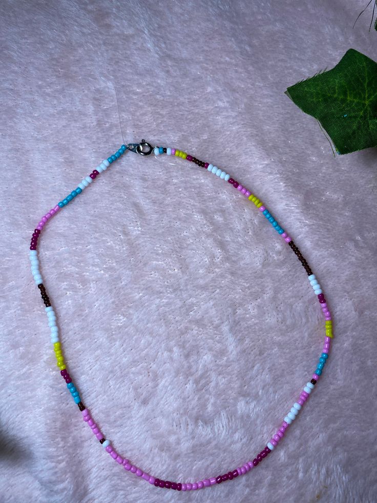 Pink and Magenta Colorful Seed Bead Necklace Colorful Casual Beaded Chain Necklaces, Casual Multicolor Beaded Necklace With Heart Beads, Colorful Casual Beaded Necklaces, Multicolor Heart Beads Casual Style, Casual Multicolor Necklaces With Spacer Beads, Casual Pink Beaded Necklace With Heart Beads, Casual Pink Beaded Necklaces, Casual Multicolor Beaded Necklaces With Tiny Beads, Casual Multicolor Beaded Necklace With Tiny Beads