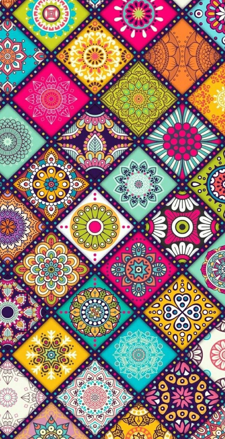 a colorful background with lots of different colored squares and flowers on the sides, all in various