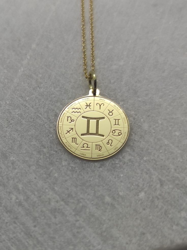 "Gemini Necklace - Engraved Gemini Charm - Gold Zodiac Charm - Gold Astrology Pendant ▪️ A beautiful and clean engraved Gemini pendant made out of 14K Solid Real Gold. Available only in yellow gold! Dimensions - Small - 16x16mm / 0.62 x 0.62 inches Medium - 18x18mm / 0.70 x 0.70 inches Big - 20x20mm / 0.78 x 0.78 inches Necklace Length - You can choose your chain length from 35CM to 50CM. The pendant is available alone without a chain, select \"No Chain\" on the necklace length section. ▪️ We ca Symbolic Yellow Gold Zodiac Jewelry, Symbolic Yellow Gold Jewelry With Zodiac Sign, 14k Gold Zodiac Sign Medallion Jewelry, 14k Gold Zodiac Sign Jewelry, Yellow Gold Zodiac Sign Jewelry For Anniversary, 14k White Gold Zodiac Sign Jewelry, Yellow Gold Zodiac Jewelry For Anniversary, Gemini Necklace, Gemini Pendant