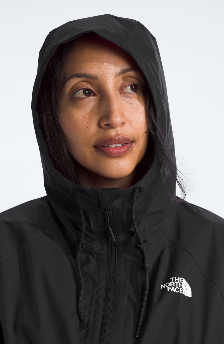 Rainy days have met their match with this hooded jacket that's breathable, lightweight and repels water and wind. 22" length (size Medium) Front zip closure Drawstring hood Stand collar Elastic cuffs Front zip pockets Seam sealed Waterproof PFC-free, durable water-repellent coating is free of per- and poly-fluorinated chemicals, some of which can be harmful to the environment 75-denier 88g/m² DryVent shell with PFC-free water-repellent finish Lined 100% nylon Machine wash, tumble dry Imported Black Moisture-wicking Windbreaker For Hiking, Black Waterproof Hooded Jacket For Rainy Weather, Functional Black Windbreaker For Rainy Season, Black Moisture-wicking Hooded Jacket For Outdoor, Black Hiking Raincoat With Adjustable Hood, Black Sporty Raincoat For Hiking, The North Face Windproof Sports Windbreaker, The North Face Sports Windbreaker Windproof, Waterproof Hooded Raincoat For Sports