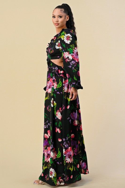 Floral print on a black background Deep V neckline, full length maxi dress, side cutouts Material: 100% Polyester Chic Floral Print Maxi Dress For Night Out, Chic Printed Maxi Dress For Night Out, Spring V-neck Maxi Dress With Cutout, Multicolor Floral Print Maxi Dress For Date Night, Spring Long Sleeve Cutout Maxi Dress, Date Night Multicolor Floral Print Maxi Dress, Printed Maxi Dress For Night Out, Black Printed Maxi Dress For Party, Black Floral Print Maxi Dress For Evening