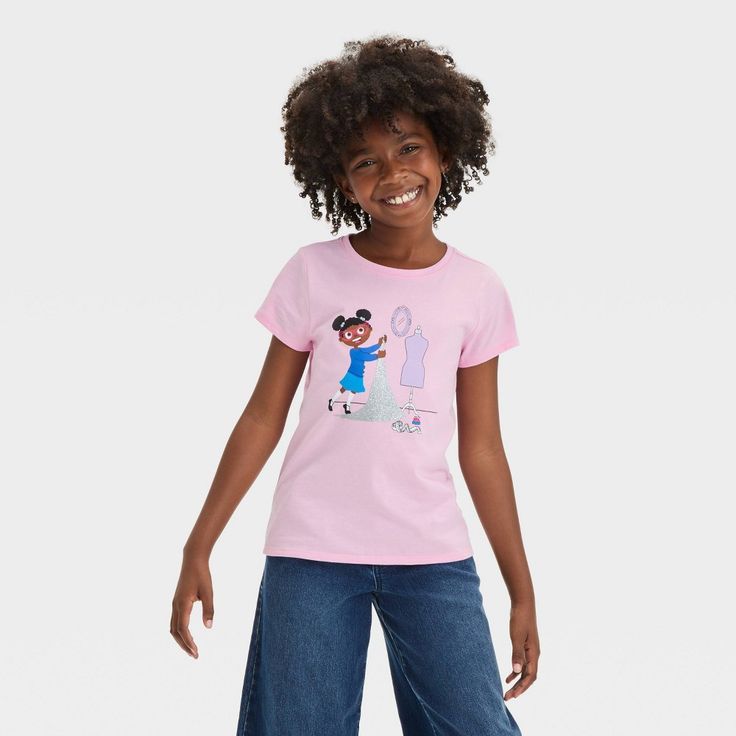 Your child will love elevating their warm-weather looks with this Short-Sleeve Plaid Star Graphic T-Shirt from Cat & Jack™. Tailored in a relaxed fit, this short-sleeve T-shirt is crafted from lightweight fabric for all-day cool comfort. Falling below the hip for wearing tucked in or untucked, this crewneck tee features a five-pointed star graphic with red and black plaid print for cute style. Cat & Jack™: Classics with an imagination of their own. Playful Stretch Crew Neck Top, Stretch Cotton Tops With Cartoon Print, Fitted Playful T-shirt With Cartoon Print, Cute Stretch Cotton T-shirt, Playful Fitted T-shirt With Character Print, Stretch Crew Neck Top With Character Print, Trendy Character Print Tops For School, Fitted Pink T-shirt With Character Print, Character Print Cotton Tops