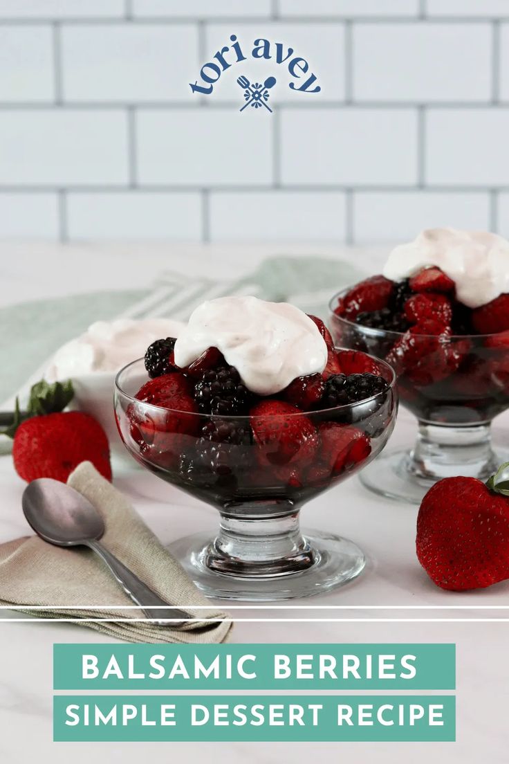 two dessert bowls filled with berries and whipped cream