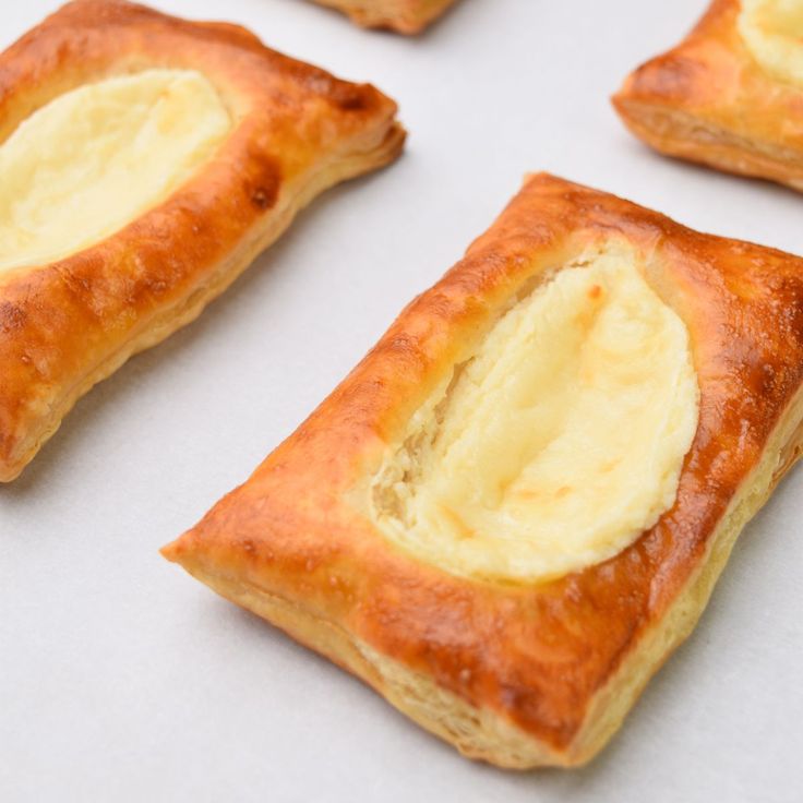 there are several pastries with butter on them