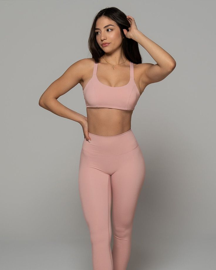 Stay supported while you sweat with this Stardust Pink Sports Bra. Featuring a solid color design, scoop neckline and strappy back - it's so stylish. Made from high-quality nylon-spandex material, it is soft and comfy. Plus, integrated quick-dry technology keeps you cool and dry. Wear with matching bottoms and fresh kicks for a simple but chic look. We are obsessed! Cross Back Activewear With 4-way Stretch, Solid Color Cross Back Activewear With 4-way Stretch, Solid Color Activewear With 4-way Stretch And Cross Back, Moisture-wicking Cross Back Activewear, Solid Moisture-wicking Cross Back Activewear, Solid Stretch Cross Back Sports Bra, Solid Color Stretch Cross Back Sports Bra, Solid Color Stretch Sports Bra With Cross Back, Nylon Stretch Cross-back Activewear