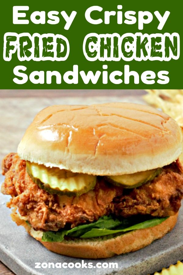 an easy crispy fried chicken sandwich with pickles on the side