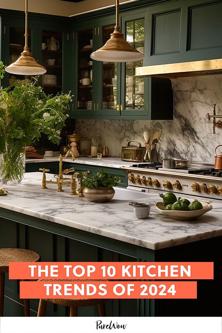 a kitchen with green cabinets and marble counter tops that says the top 10 kitchen trends of 2020