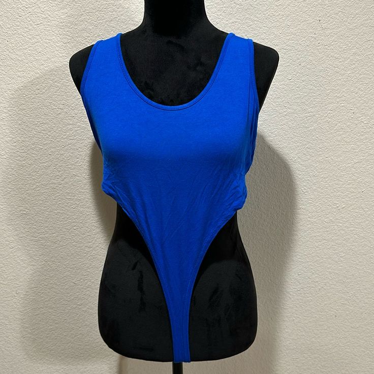 Prettylittlething Blue High Leg Bodysuit - Never Worn Fitted Blue Bodysuit For Beach, Fitted Blue Bodysuit For The Beach, Chic Blue Stretch Bodysuit, Stretch Blue Bodysuit For Swimming, Blue Sleeveless Bodysuit For Swimming, Chic Blue Fitted Bodysuit, Blue Summer Bodysuit For Parties, Blue Bodysuit For Summer Parties, Trendy Fitted Blue Swimwear