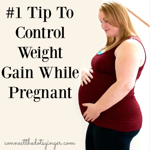 a pregnant woman standing in front of a white wall with the words 1 tip for a healthy pregnancy