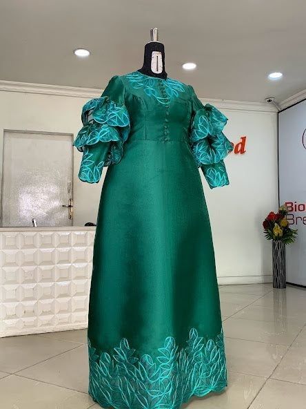 Garbadin fabric is the perfect one on this dress. Visit for more and don't forget to follow Robe Pour La Dote, Female Kaftan Styles Nigeria, Material Gown Styles For Ladies, Mikado Styles, Latest Material Gown Styles, Shape Gown, Material Gown, Aline Gown, Corporate Wears