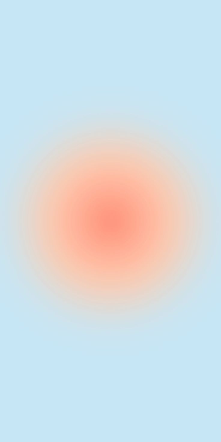 an orange circle is shown in the middle of a light blue sky with white clouds