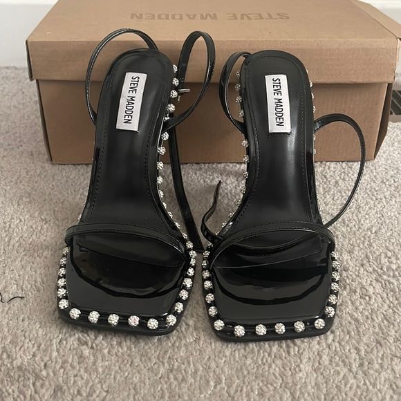 Steve Madden Zelle Black Heels Steve Madden Zelle Heels, Steve Madden Heels Aesthetic, Prom Heels Aesthetic, Black Heels With Rhinestones, Heels For Prom Black, Black High Heels For Prom, Steve Madden Heels Outfit, Black Prom Heels, Steve Madden Shoes Outfit