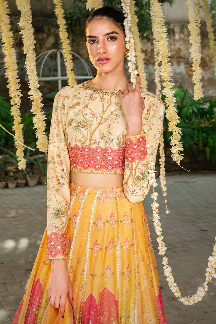 Daamla – Sania Maskatiya International Bollywood Style Lehenga With Printed Motifs For Reception, Yellow Floral Print Sets For Designer Wear, Festive Lehenga With Printed Motifs For Reception, Festive Printed Lehenga For Reception, Festive Printed Motifs Lehenga For Reception, Festive Reception Lehenga With Printed Motifs, Fitted Yellow Sharara With Floral Print, Yellow Chanderi Sets For Reception, Reception Lehenga With Printed Motifs In Georgette