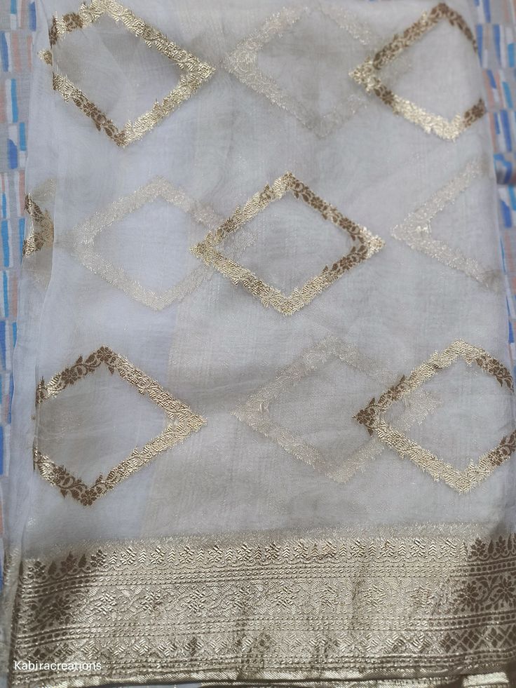 More wedding dupatta and accessories here in our collection https://www.etsy.com/in-en/shop/KabiraCreations?ref=related&listing_id=1077422871#items A beautiful white soft organza dupatta with intricate Banarasi work.  Choose from our range of exquisitely designed and curated dupattas, each piece is designed to perfection with intricate detailing that lends an aura of grandeur to your outfits. Specification Material- Soft Organza Banarasi  Length- 2.25 meters All over Banarasi motifs  * Note: our Eid Traditional Wear With Gota Work On Tissue Silk, Art Silk Kurta With Sheer Dupatta For Navratri, Diwali Anarkali Dupatta With Cutdana, Bollywood Style Churidar With Cutdana For Diwali, Festive Anarkali Dupatta With Cutdana Detail, Festive Tissue Silk Kurta With Dupatta, White Dola Silk Salwar Kameez With Gota Work, Navratri Art Silk Kurta With Sheer Dupatta, Diwali Art Silk Kurta With Sheer Dupatta