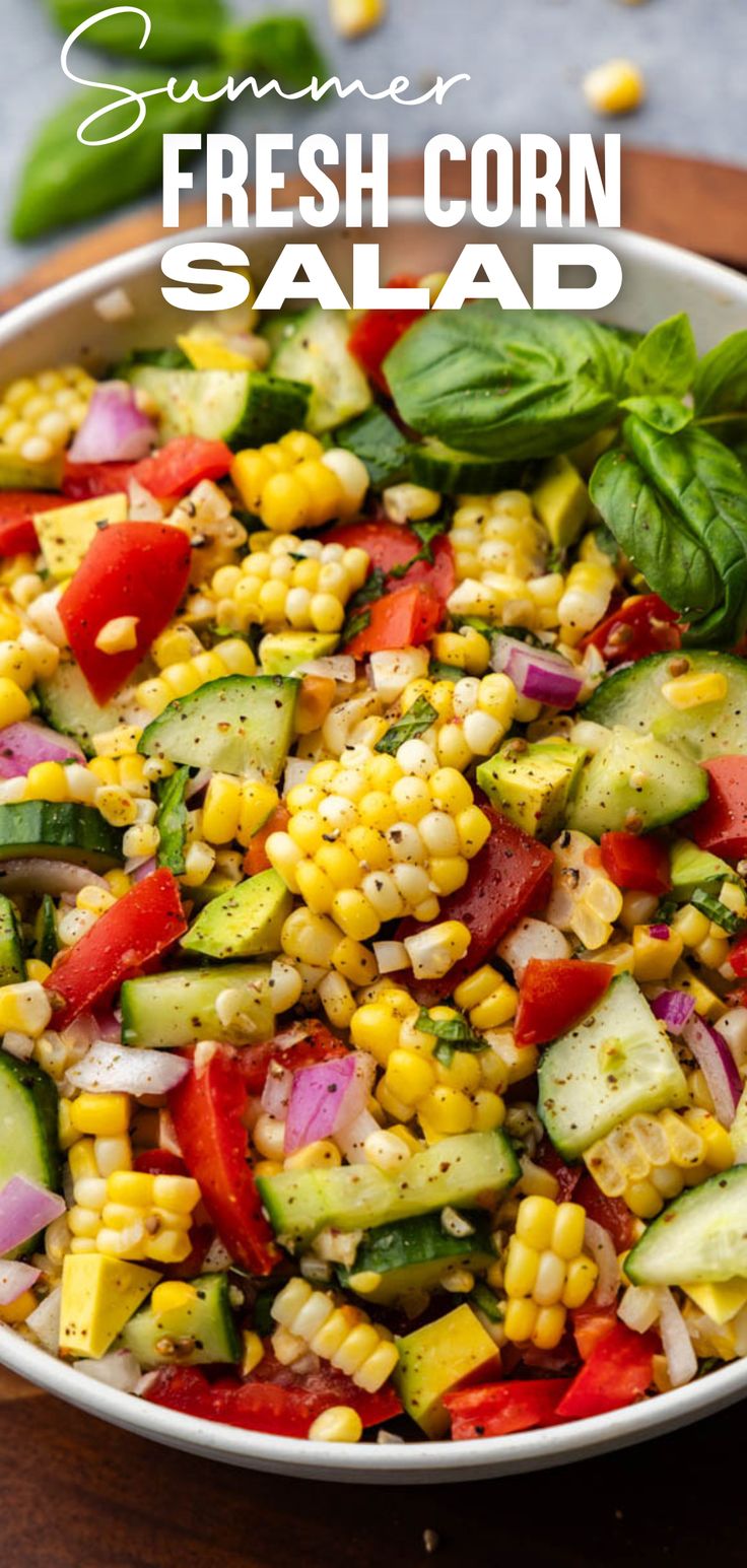 An overhead view of a bowl of corn salad with tomatoes, cucumber, and avocado. Salad With Roasted Corn, Salads With Vegetables, Summer Salad With Protein, Best Grill Out Sides, Fresh Corn Salad Summer, Summer Carrot Side Dish, Fresh Side Dishes Summer, Corn Salad For Bbq, Summer Meal Salads