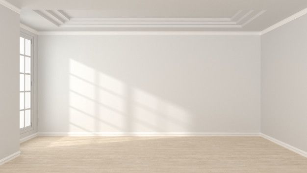 an empty room with white walls and wooden floors