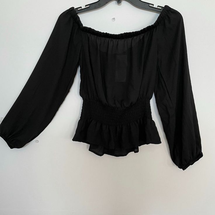 Ultra Flirt Juniors Smocked Ultra Flirt Juniors Smocked Off-The-Shoulder Black S Ruched Off-shoulder Blouse For Night Out, Off-shoulder Ruched Blouse For Night Out, Black Ruched Off-shoulder Top, Black Long Sleeve Off-shoulder Top For Summer, Elegant Off-shoulder Top With Smocked Bodice, Chic Off-shoulder Smocked Top With Elastic Shoulders, Chic Off-shoulder Tops With Elastic Neckline, Black Off-shoulder Blouse With Ruffles, Chic Black Peasant Top For Spring