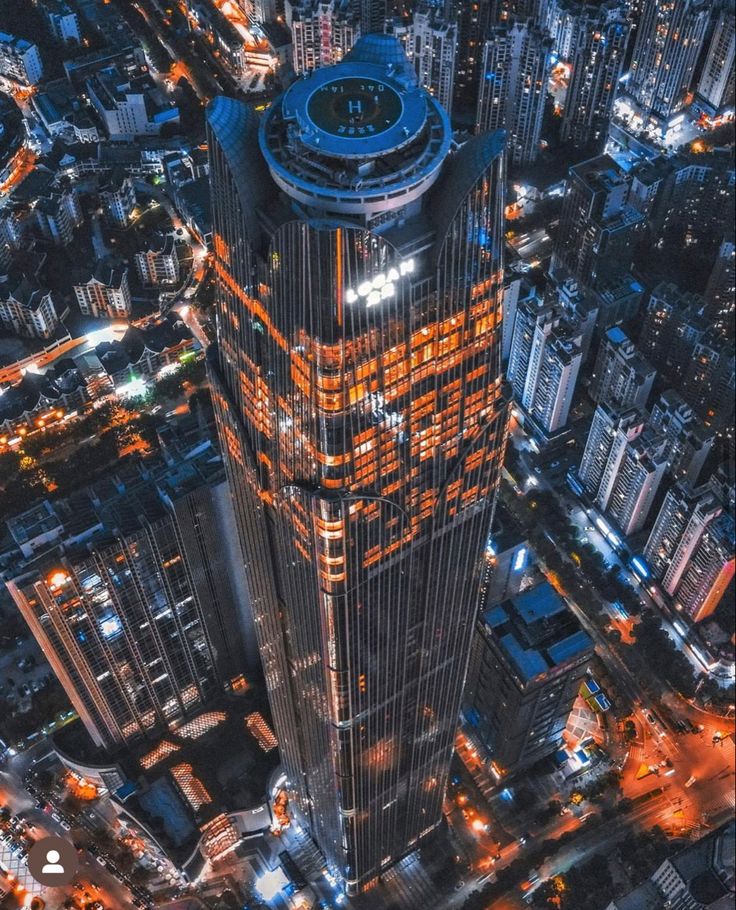 an aerial view of a skyscraper at night