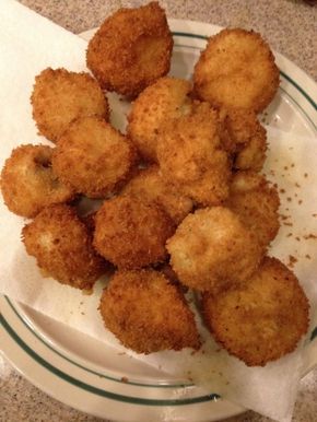 some fried food is on a white plate