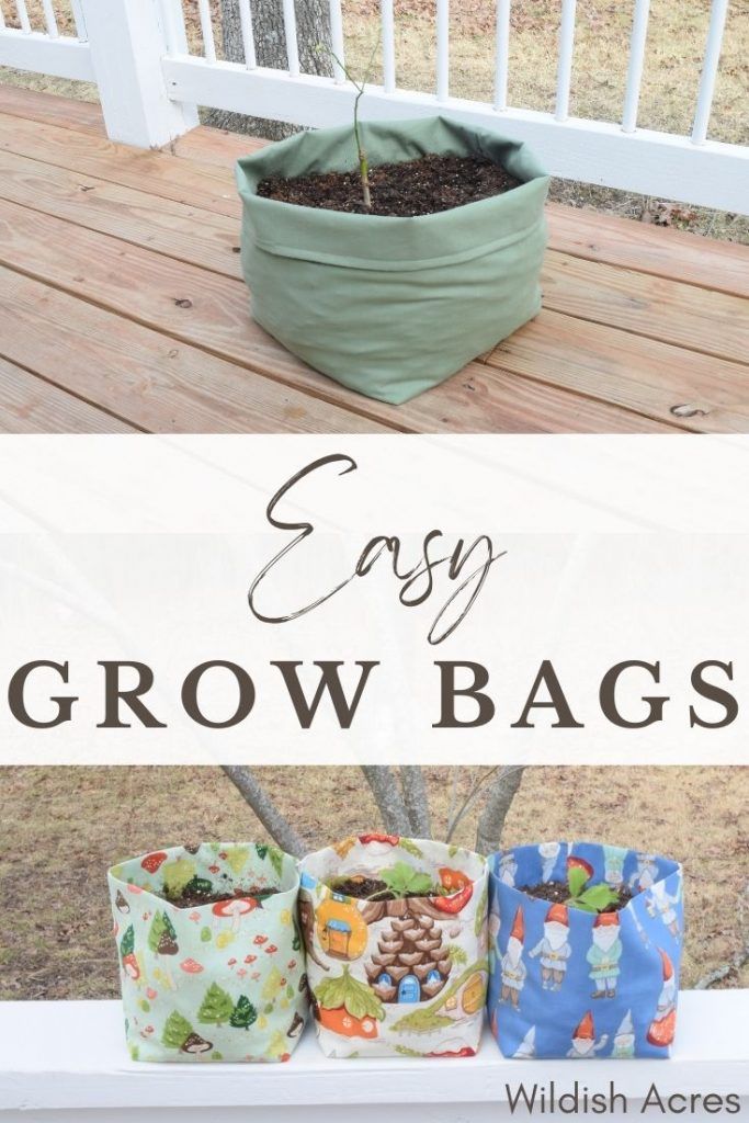 three bags sitting on top of a wooden deck next to a planter filled with plants