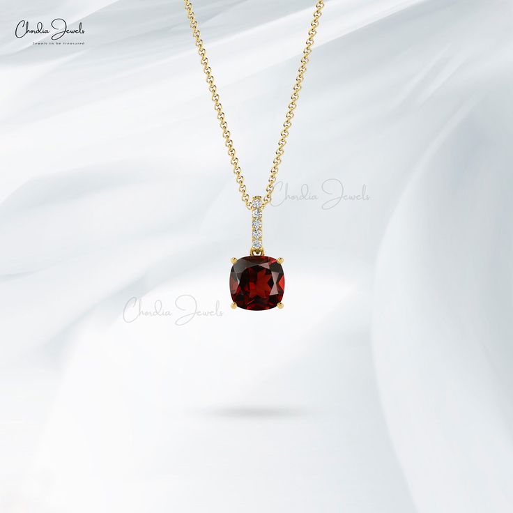 Description Featuring a charismatic 6MM cushion-shaped Garnet in a claw setting, this solitaire pendant with shimmering linear bale evokes enchanting charm, sculpted in 14k solid gold with January birthstone red-hued garnet and white 1MM round diamonds for the stunning style of purpose. The gold chain shown in pictures is just for reference and display purpose, in order pendant comes with a COMPLIMENTARY 925 SILVER CHAIN. Product Details SKU CJ-P-1162B-G Metal 14K solid gold Product dimension 12 Stunning Style, Claw Setting, Garnet Pendant, Diamond Bar, January Birthstone, Solitaire Pendant, Unique Pendant, Pure Gold, Red Garnet