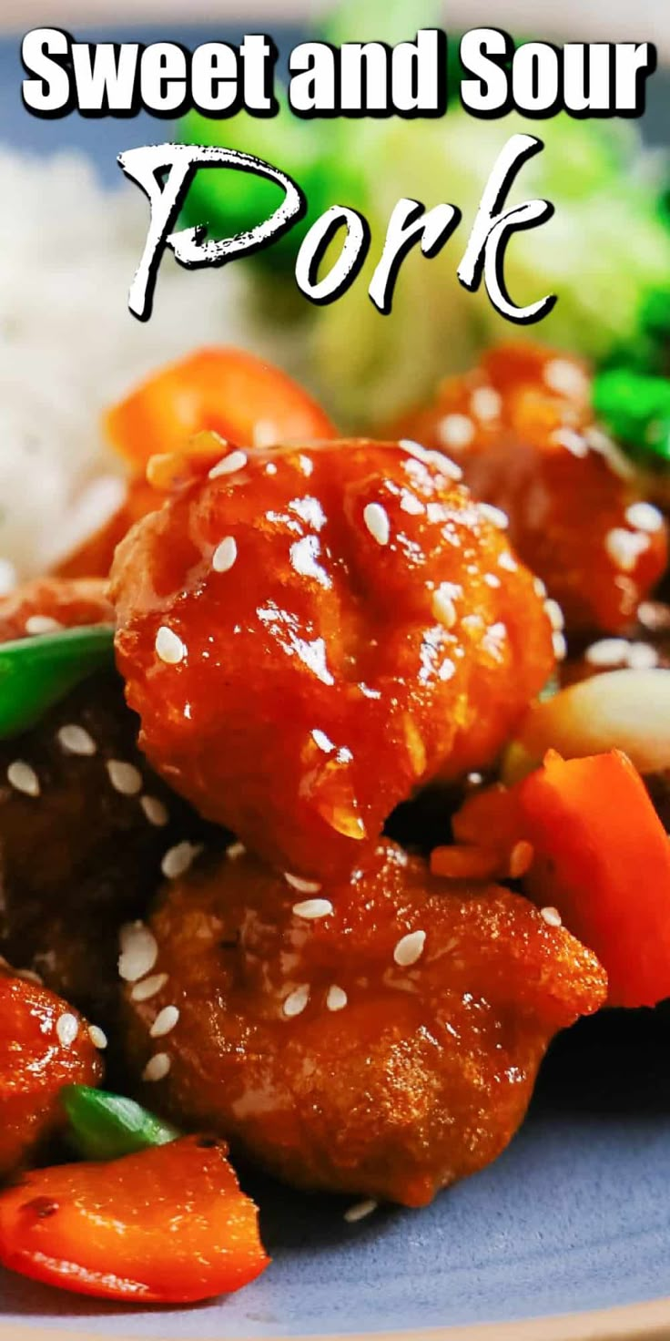 sweet and sour pork with vegetables on a plate