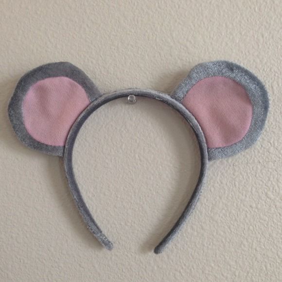 a mouse ears headband is hanging on the wall