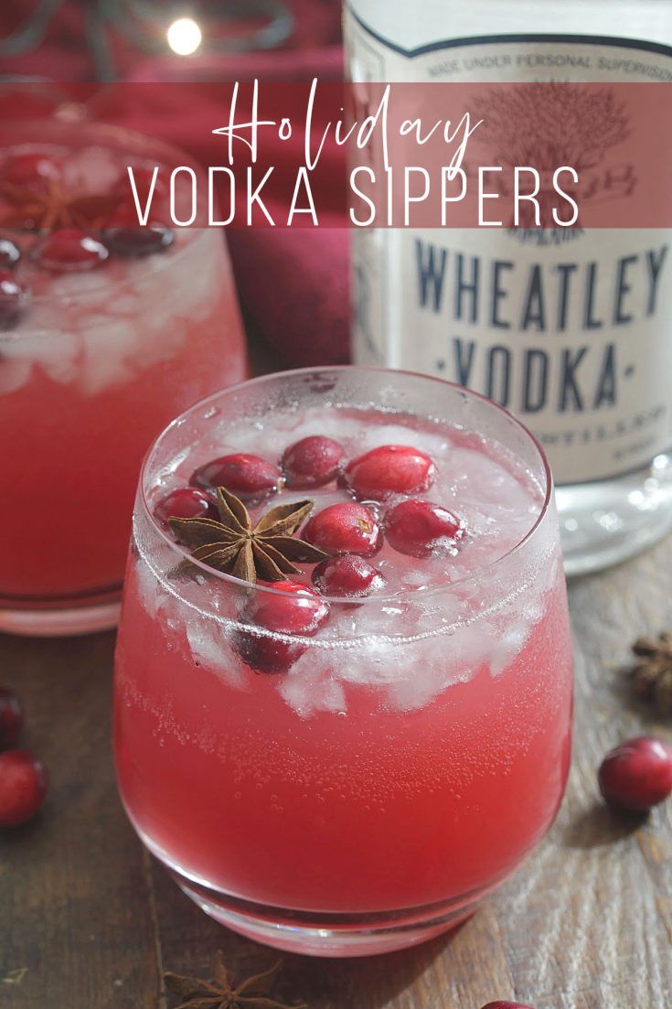 two glasses filled with vodka and cranberries