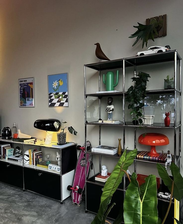 a living room filled with lots of furniture and plants on top of shelves next to each other