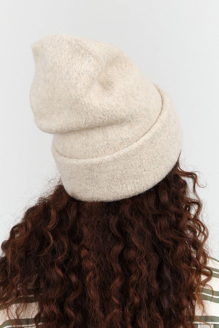 Embrace the colder seasons with the Carpenter Hat, a stylish oversized double layer beanie designed for ultimate comfort and warmth. Featuring a large fold-over brim, this modern cozy fit is perfect. Whether you're out for a stroll or enjoying time by a fire, the Carpenter Hat is your go-to companion for effortless style and snug warmth. Cozy Soft Hats For Cold Weather, Cream Hats For Cold Weather In Fall, Cold Weather Fall Hats One Size, Cozy Snug Hats For Cold Weather, Beige Everyday Hats For Fall, Everyday Beige Hats For Fall, Warm Snug Hats For Fall, Slouchy Hats For Cold Weather, Beige Fall Hats For Everyday Wear