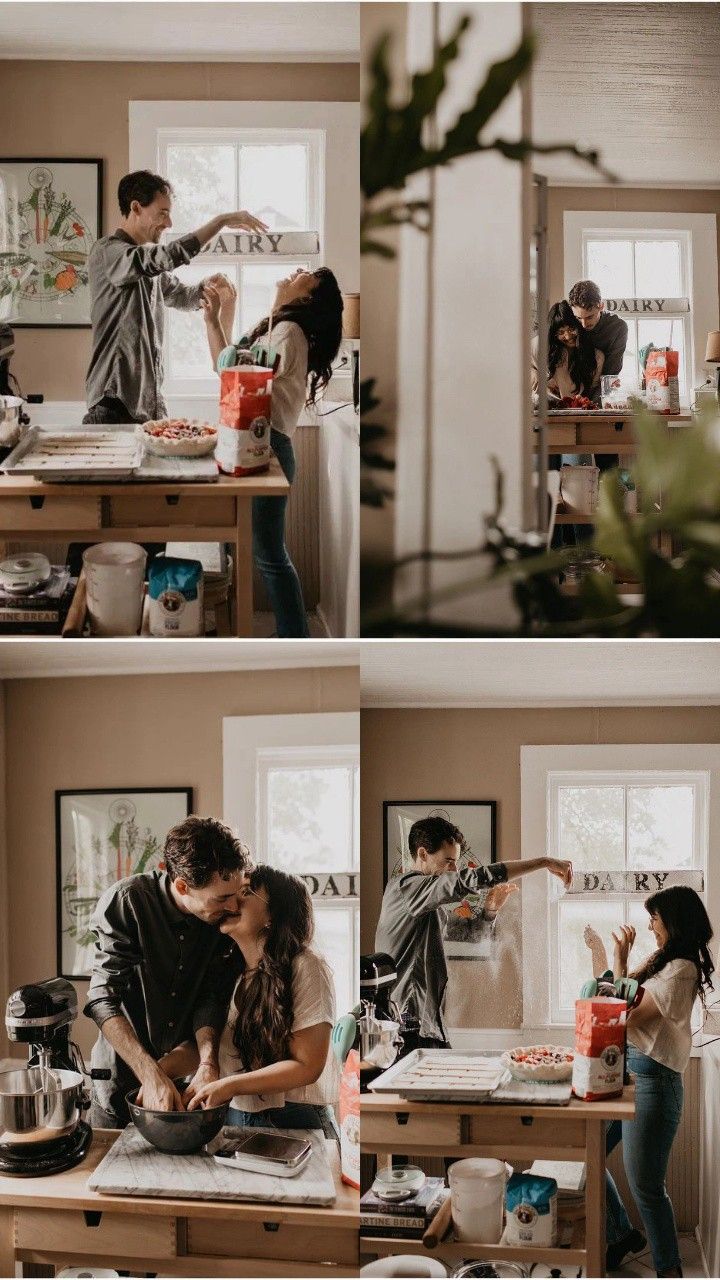 two people are kissing in the kitchen while another person is making something on the counter