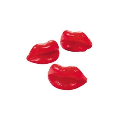 three pieces of red lipstick sitting on top of each other