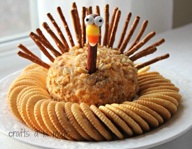 an image of a turkey cracker on top of a plate with crackers in the shape of a bird