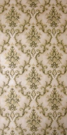 an old fashioned wallpaper with green and white designs