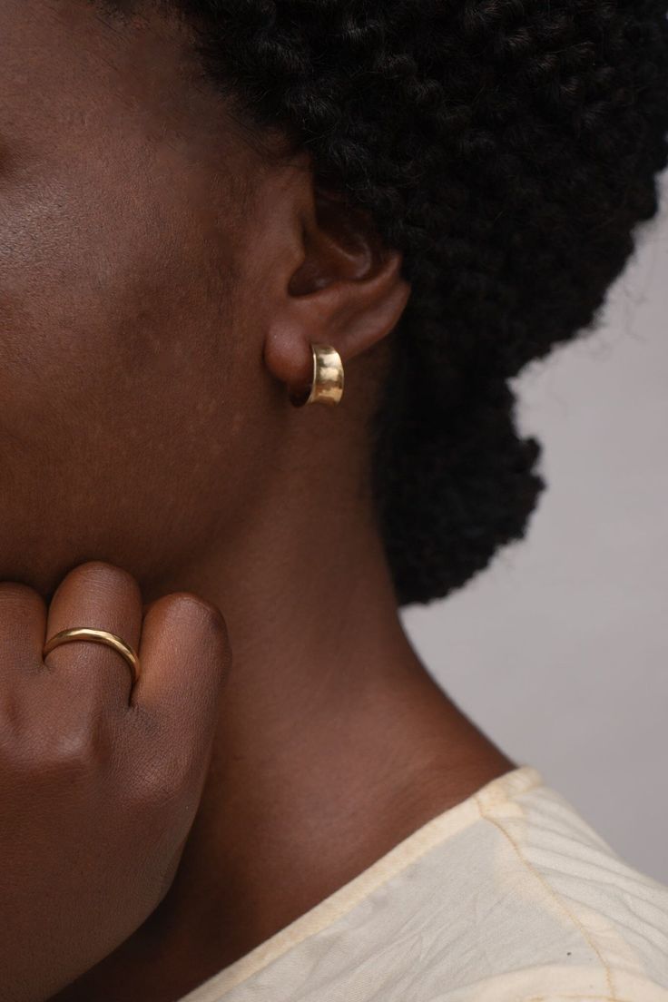 14k recycled gold-plated brass Nickel & lead free Crafted using responsibly sourced and recycled metals Handmade in a solar-powered workshop in rural Malawi The 'Chalu' Ring (meaning 'natural earth' in Tumbuka) is crafted with a wabi-sabi organic design in mind, giving it a rustic, natural feel. The irregular beauty is sure to make a statement, perfect for a special occasion or everyday wear. Crafted from brass coated in a luxuriously thick layer of 14k recycled gold to ensure both longevity and Matte Gold Brass Jewelry For Anniversary, Adjustable Heirloom Brass Jewelry, Everyday Hammered Recycled Gold Rings, Gold Heirloom Jewelry For Everyday Wear, Gold Minimalist Jewelry For Promise, Everyday Heirloom Gold Jewelry, Heirloom Style Everyday Gold Jewelry, Heirloom Brass Jewelry Tarnish Resistant, Heirloom Style Recycled Gold Jewelry For Everyday