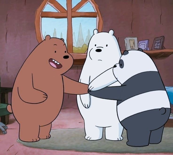 there are two bears standing next to each other in the living room and one bear is touching another bear's chest