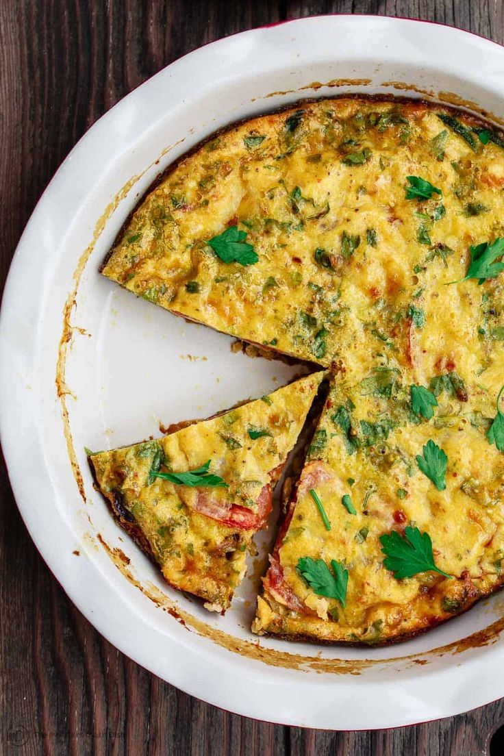 an omelet is cut into slices on a plate