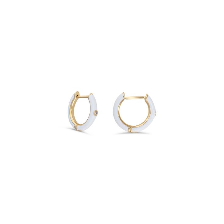 Description Enamel huggie earrings without the mark-ups are finally here. Drop earrings and stud earrings are great, but nothing makes an outfit like enamel hoops. These new arrivals will beautifully adorn your earlobes. Perfect for a first hole, second hole, or cartilage hoop. These enamel huggie earrings are perfect for everyday wear. These diamond huggies feature .02 brilliant-cut carats. Choose the metal type you like best: 14k white gold, 14k yellow gold, 14k rose gold. These bestselling en White Diamond Earrings In 14k Gold, Everyday Fine Jewelry White Hoop Earrings, White Fine Jewelry Hoop Earrings For Everyday, Everyday White Huggie Jewelry, Everyday Fine White Hoop Earrings, Minimalist White Huggie Jewelry, Fine Jewelry White Small Hoop Earrings, White Diamond Small Hoop Earrings, White Diamond Hoop Earrings For Pierced Ears