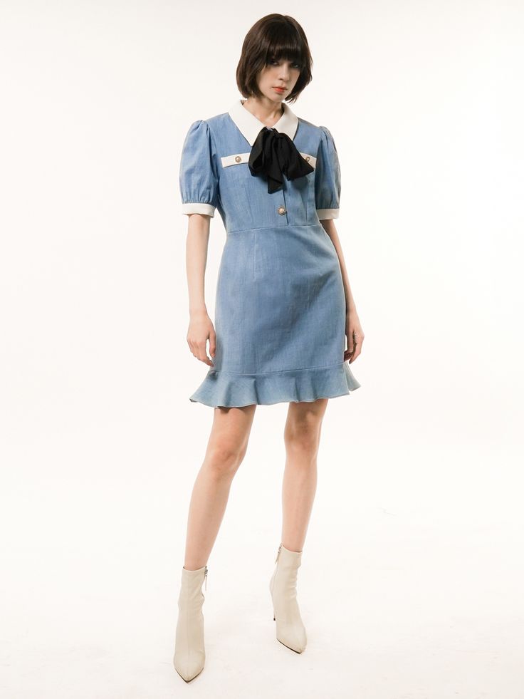 Editor's NotesInspired by past style icons and reinterpreting the retro aesthetic for the modern age, this romantic mini dress embodies a nostalgic yet contemporary charm.- Crafted from a blend that includes Tencel- Pointed collar, black ribbon, and balloon half-sleeves- High-rise waist seam and a flared hem, creating a voluminous and soft silhouette* The belt is sold separately and is not included.* The color in model photos may vary from the actual product due to lighting and staging; the actual color is closer to the product image.Measurements(in.)Size(S/M)- Chest: 17.32 in. / 18.90 in.- Shoulder: 14.57 in. / 15.35 in.- Waist: 15.75 in. / 16.93 in.- Hem Width: 22.44 in. / 23.23 in.- Sleeve: 11.02 in. / 11.42 in.- Length: 34.25 in. / 35.04 in.* Model info: Height 5’ 91” Bust 30 Waist 22 Chic Vintage Mini Dress For Spring, Elegant Mini Denim Dress For Spring, Elegant Short Sleeve Denim Dress, Vintage Cotton Mini Dress, Vintage Cotton Mini Dress With Ruffles, Vintage Chic Short Sleeve Dress, Chic Short Sleeve Vintage Fashion Dress, Chic Short Sleeve Denim Dress For Daywear, Chic Short Sleeve Vintage Dress