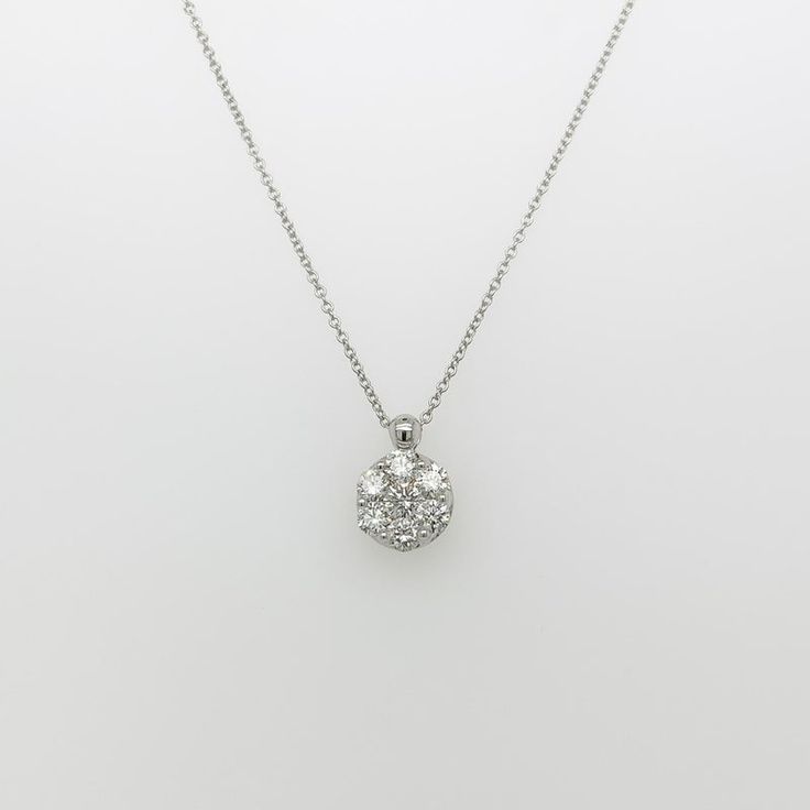 A fine Italian gold & diamond necklace.  In 14k white gold.  Prong set with 7 round brilliant cut diamonds in a stylized floral form.  (Overall ca. 3/4 total carat weight; Color range: G-H; Clarity range: VS-SI)  Accompanied by a GEMLAB (Gemological Appraisal Laboratory) report.  Simply a wonderful diamond pendant for any occasion!  Date: 20th Century  Overall Condition: It is in overall good, as-pictured, used estate condition with some fine & light surface scratches and other signs of expected Exquisite Cubic Zirconia Diamond Necklace, Exquisite Platinum Necklace With Single Cut Diamonds, Dazzling Platinum Necklace With Brilliant Cut, Formal Silver Diamond Chain Necklace, Luxury Diamond Necklace With Sparkling Round Cut Stones, Exquisite Silver Diamond Cut Diamond Necklace, Exquisite Diamond Necklace In Diamond White, Exquisite Diamond Round Pendant Necklace, Exquisite Silver Diamond Necklace With Diamond Cut