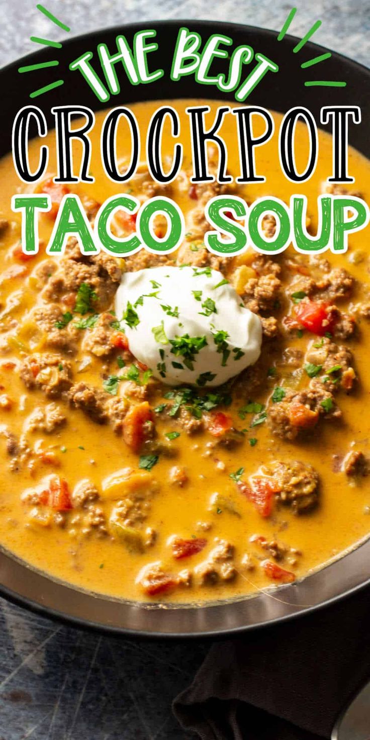 the best crockpot taco soup in a pan with sour cream on top