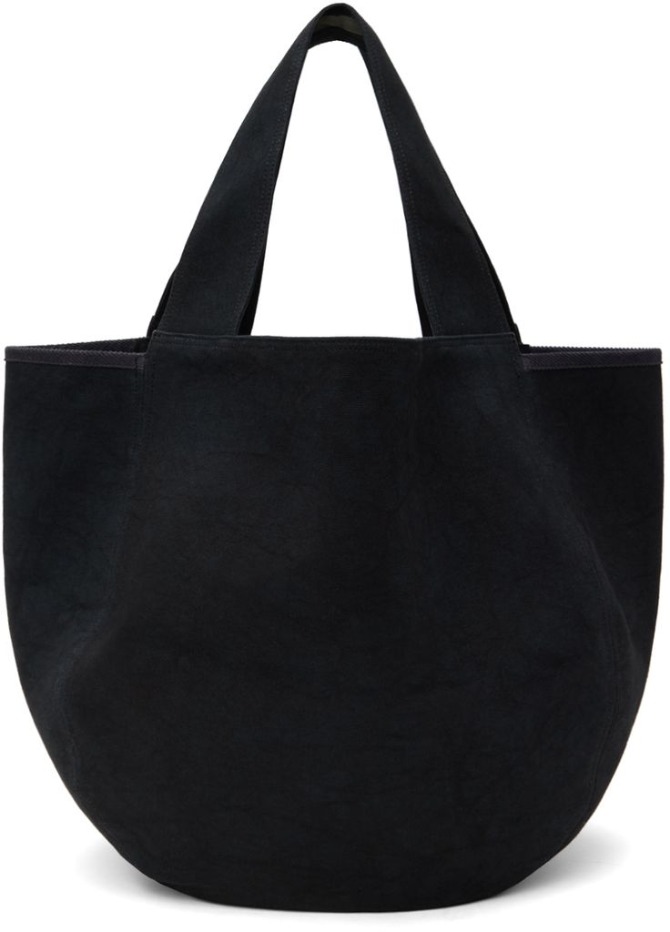 Cotton canvas tote in black. · Fixed shoulder straps · Corduroy trim at collar · Suede logo patch at side · Open throat · Patch pocket at interior · Unlined · H16 x W29 x D14 Supplier color: Black Black Canvas Bag With Canvas Lining For Shopping, Black Canvas Bag For Shopping With Canvas Lining, Black Shopping Bag With Canvas Lining, Classic Black Canvas Shoulder Bag, Classic Black Canvas Bag, Casual Black Shoulder Bag With Waxed Finish, Black Waxed Finish Casual Shoulder Bag, Casual Black Waxed Finish Shoulder Bag, Casual Black Canvas Bag With Leather Trim