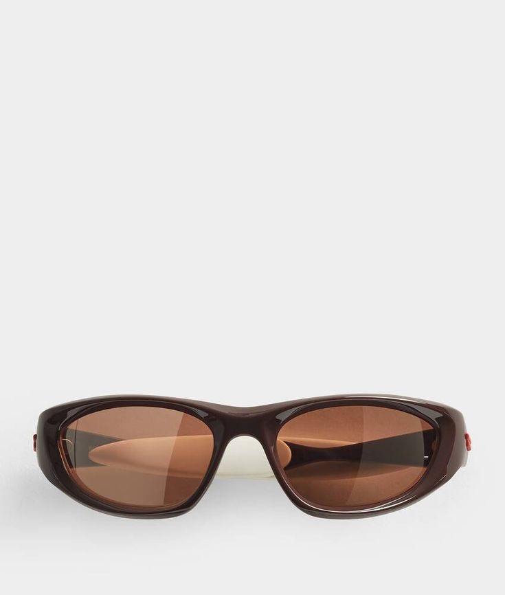 Bottega Veneta® Cone Wraparound Sunglasses in Brown. Shop online now. Wraparound Sunglasses, Sunglasses Luxury, Sunglasses Store, Sunglasses Logo, Fashion Eye Glasses, Sunglasses Brown, Stylish Glasses, Luxury Eyewear, Brown Sunglasses